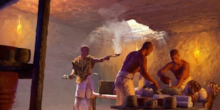 A priest burns incense in an embalming chamber as other people prepare a body for burial