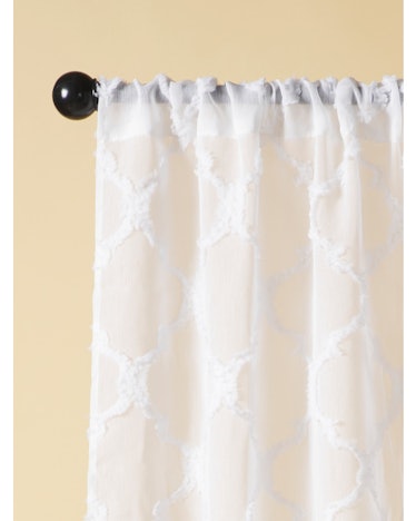 These sheer curtains are part of the spring home decor trends 2023, according to experts.