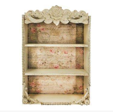 This wall cubby has Regencycore vibes inspired by 'Bridgerton,' which is a spring 2023 home decor tr...