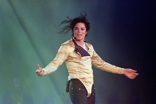 Michael Jackson performing on stage in 1996