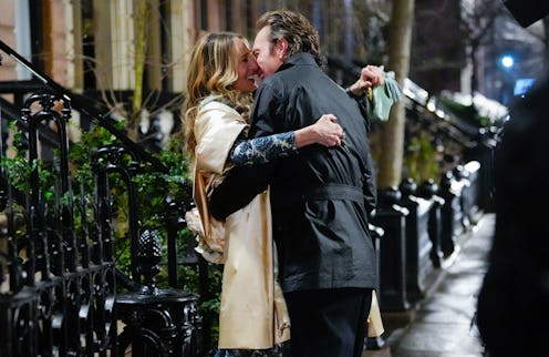 Sarah Jessica Parker and John Corbett kissing during a scene for 'And Just Like That'  in Feb 2023
