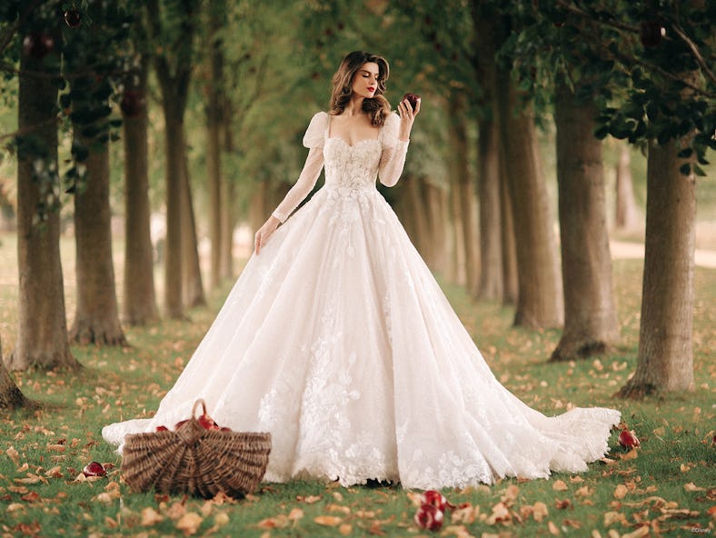 Disney's Fairy Tale Weddings 2023 collection includes an Aurora wedding dress with statement sleeves...