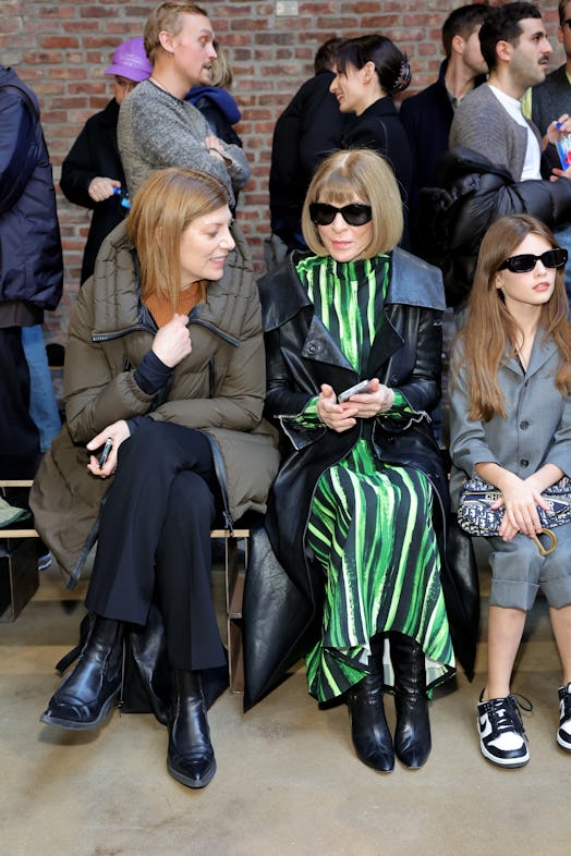 Virginia Smith, Anna Wintour and Marlowe Ottoline Layng Sturridge seated front row at a fashion show