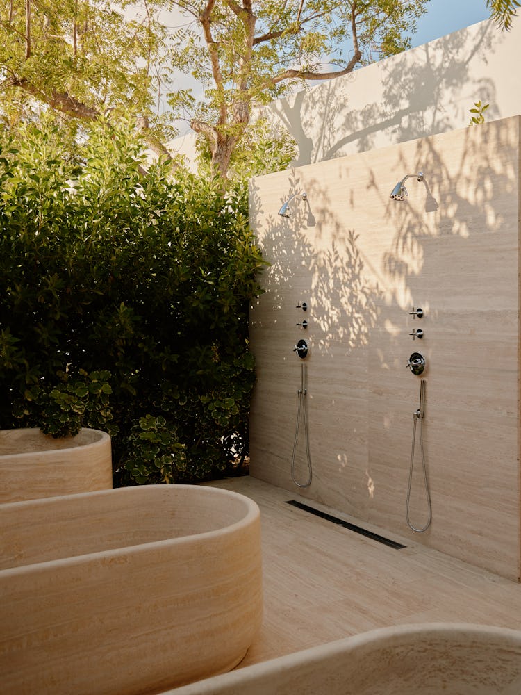 outdoor tubs and showers at a spa