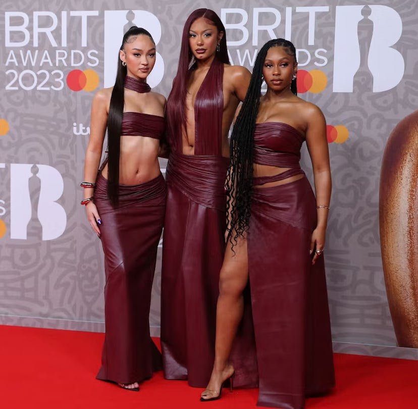 British group Flo poses on the red carpet at the BRIT Awards 2023
