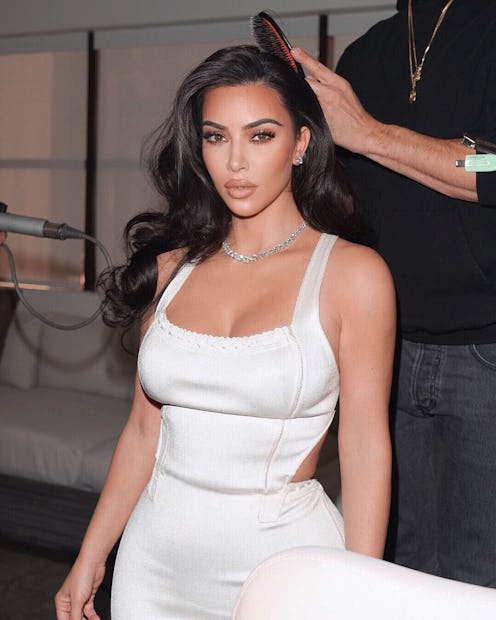 Kim Kardashian getting bangs styled