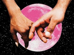 A couple holding hands in front of a pink moon after learning the best day to get married in 2023, a...