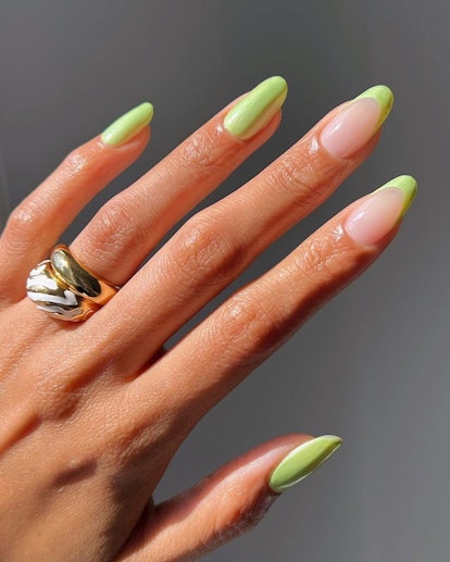 Soft light green nails with french tips