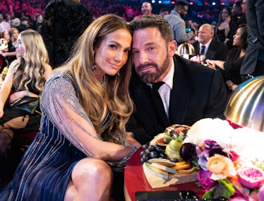 Jennifer Lopez and Ben Affleck embrace at an award show