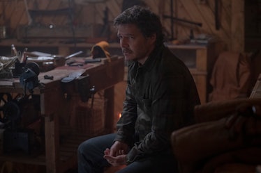 Pedro Pascal's Joel Miller sits in a repair shop in The Last of Us Episode 6