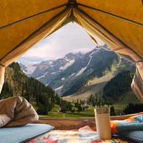 Inside of tent looking out to beautiful mountain vista
