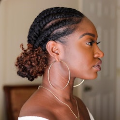 Flat twists are the key to a sleek twisted low bun style.