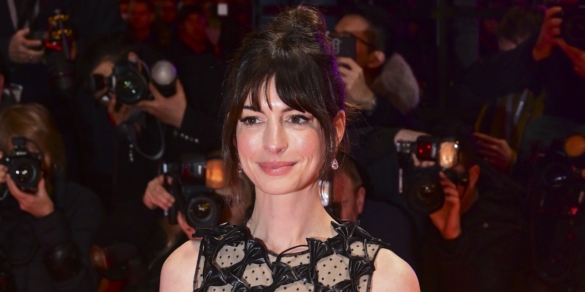 Anne Hathaway Serves Andy Sachs In A Naked Leather Dress - TrendRadars