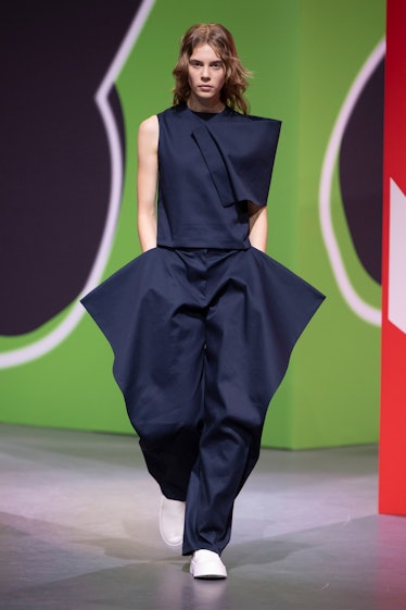 Fashion designer Jonathan Anderson walks the runway during the