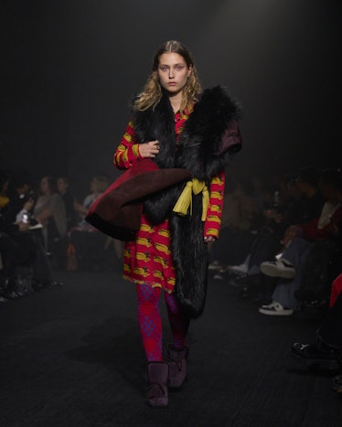  A model walks the runway at the Burberry show during London Fashion Week February 2023 on February ...