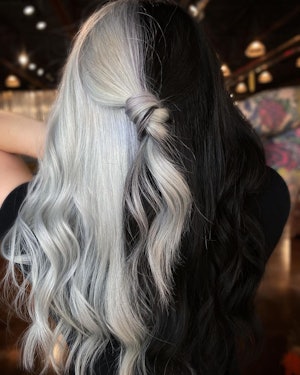 The gemini hair color trend combines two hair colors, like platinum blonde and black.