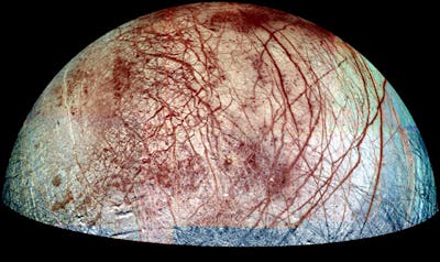 one hemisphere of europa with cracks across its surface