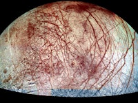 one hemisphere of europa with cracks across its surface