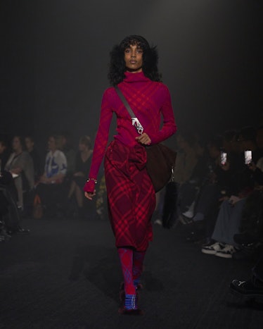 A model walks the runway at the Burberry show during London Fashion Week February 2023 on February 2...