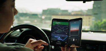 The Surface Duo 2 being used for navigation and music.