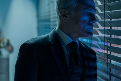 Christoph Waltz looks out the window in 'The Consultant.'