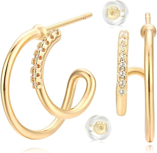 These earrings that look like multiple piercings have two hoops, one of which has crystals.
