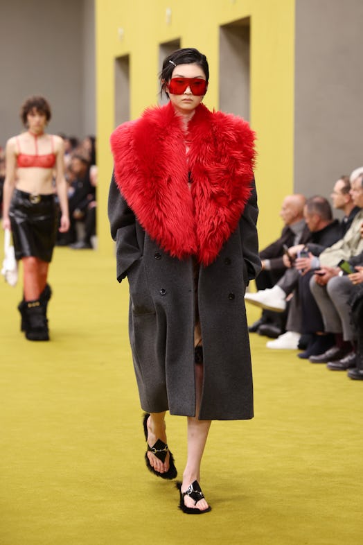 A model walks the runway at the Gucci show during Milan Fashion Week Fall/Winter 2023/24 on February...