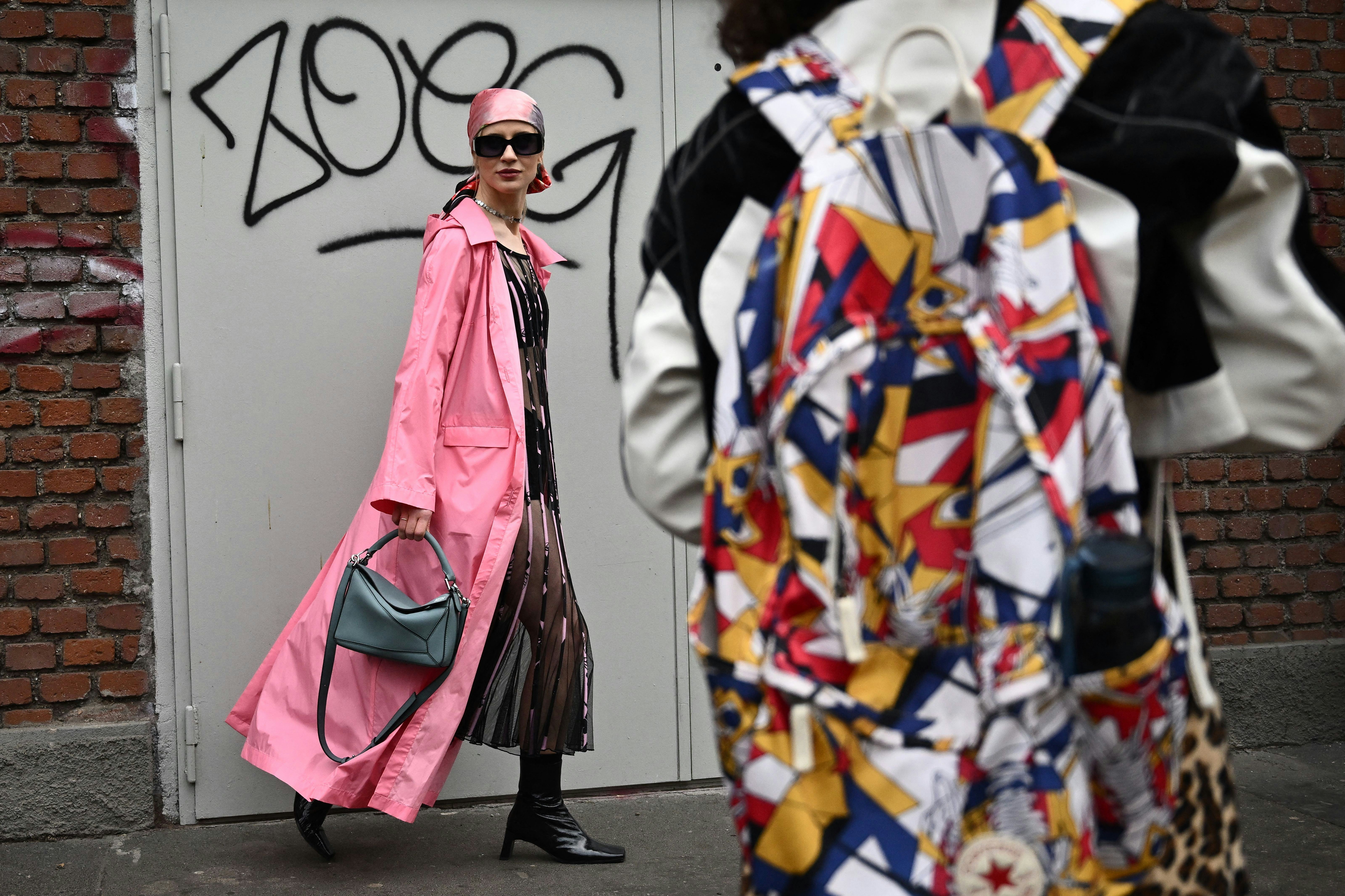 People arrive to attend the presentation of Fendi's Fall-Winter 2023-2024 Women's and Men's collecti...