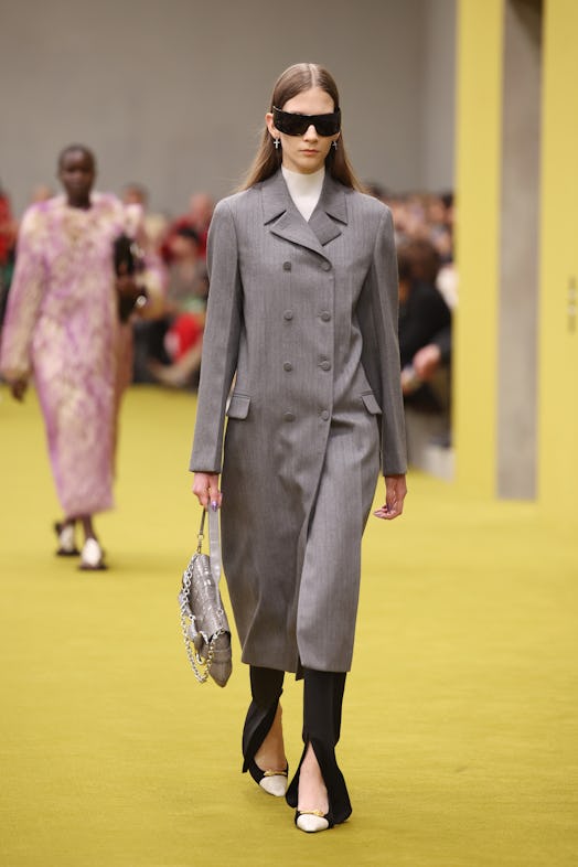 A model walks the runway at the Gucci show during Milan Fashion Week Fall/Winter 2023/24 on February...