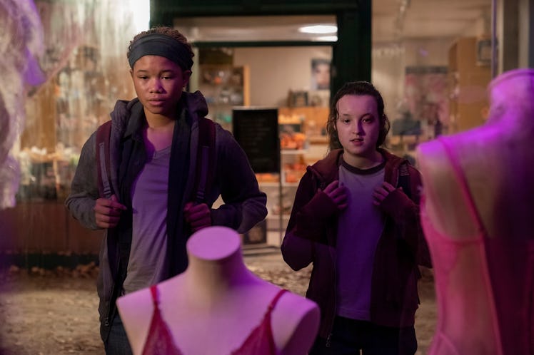 Riley (Storm Reid) and Ellie (Bella Ramsey) stand in front of some mannequins in The Last of Us Epis...