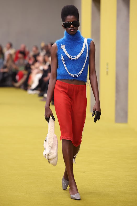 A model walks the runway at the Gucci show during Milan Fashion Week Fall/Winter 2023/24 on February...