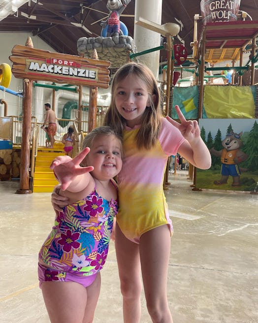 The author’s two older daughters standing outside of their favorite water play area of Great Wolf Lo...