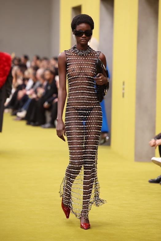 A model walks the runway at the Gucci show during Milan Fashion Week Fall/Winter 2023/24 on February...