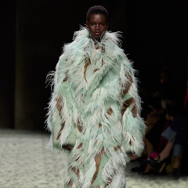 model in a feathered coat