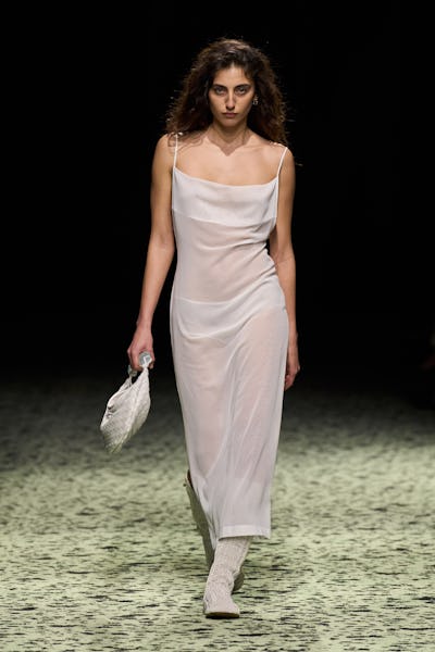 model in white sheer dress