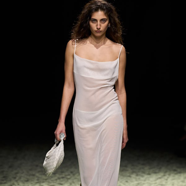 model in white sheer dress