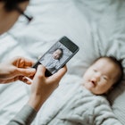 Parent taking photo of their baby with a smart phone