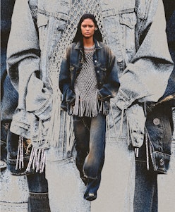 A model wears a denim jacket on top of baggy denim jeans, demonstrating the denim trend's explosive ...