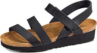 If you're looking for open-toe shoes for walking on concrete, these sandals feature a supportive cor...
