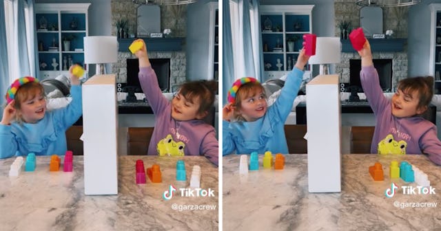 Twin daughters wow their mom with their ability to pick the same colored blocks repeatedly.