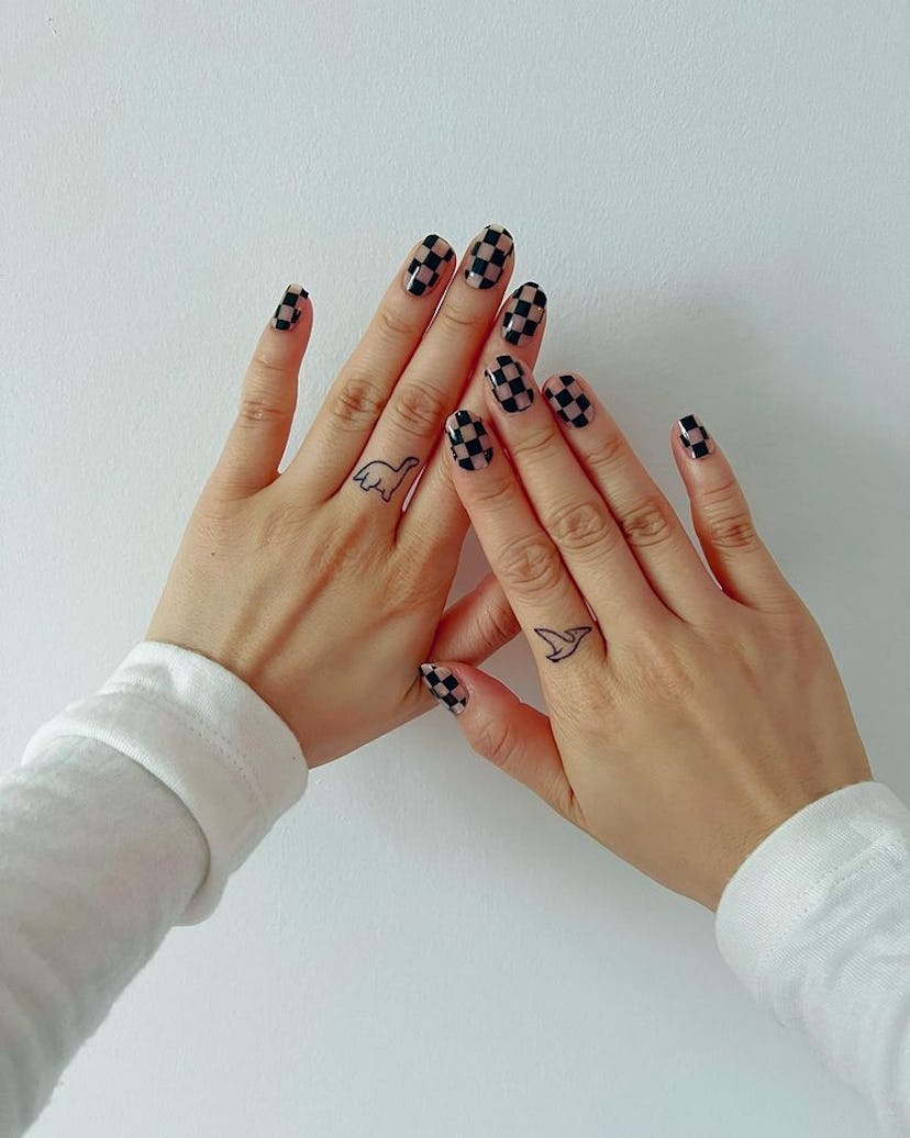 Graphic nail art will trend in 2023.