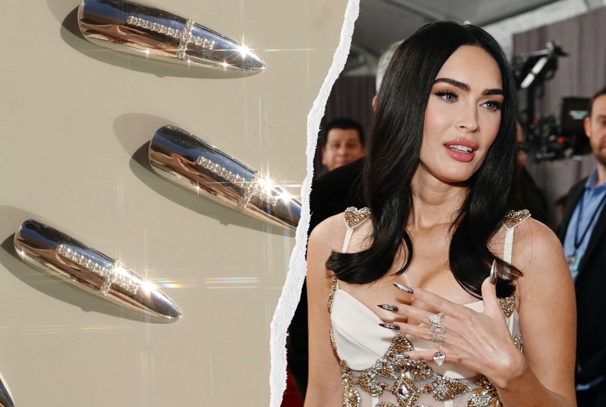 Megan Fox wore. diamond cross nail art on silver chrome stiletto nails at the 2023 Grammy Awards wit...