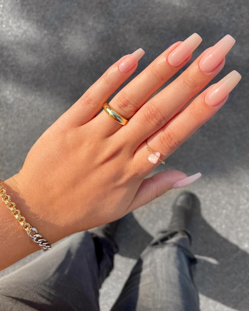 Lip gloss nails, aka high-shine nude nails, are the chicest manicure trend of 2023.