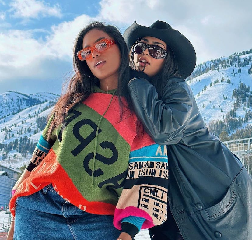 Monet McMichael poses in front of mountains at the Jackson Hole Glow Recipe influencer trip hotel in...