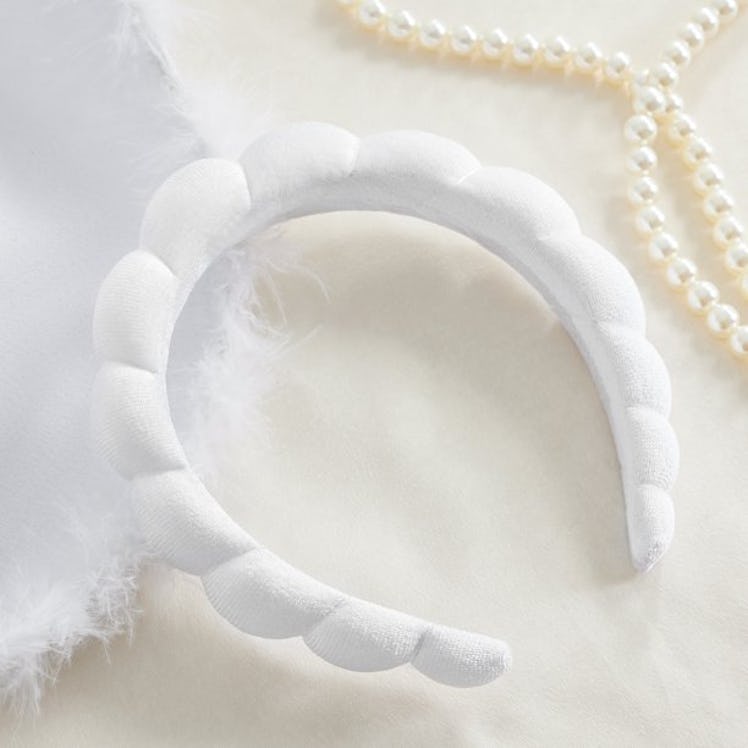 This white sponge spa headband from Walmart is a Versed dupe. 