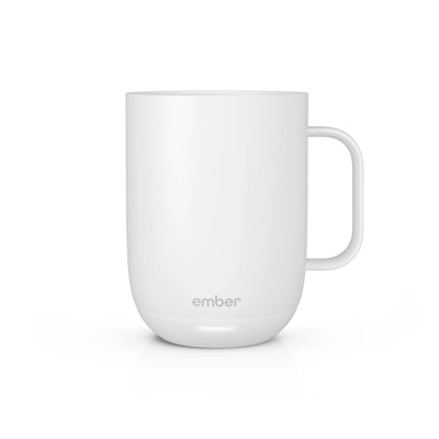 A white heated coffee cup from the brand Ember