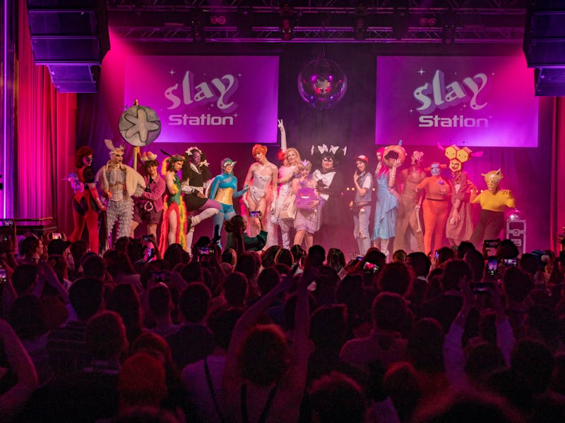The SlayStation performers onstage with the finalists of the costume competition