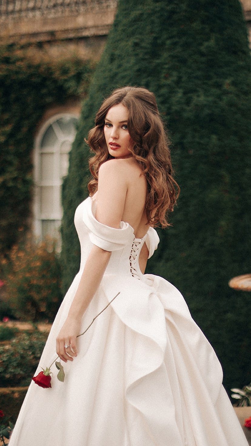 The Disney's Fairy Tales wedding dress inspired by Belle features a giant lace up bow in the back. 