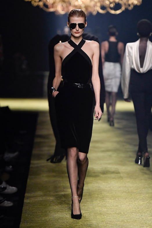 A model walks the runway during the Saint Laurent Ready to Wear Fall/Winter 2023-2024 fashion show a...