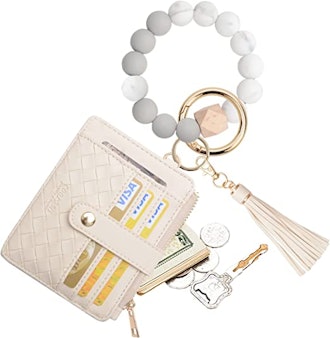 If you're looking for cheap but stylish accessories, grab one of these cute wristlets that have an a...